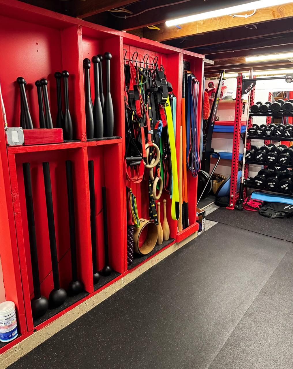 Organized functional training equipment storage inside a private personal training gym in Coon Rapids Minnesota