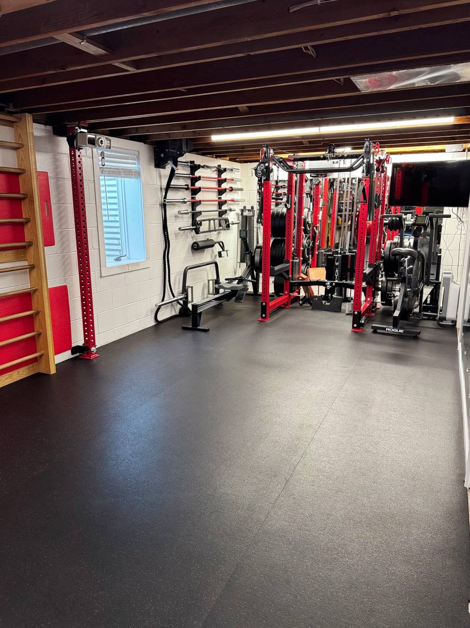Open training floor inside a private personal training gym in Coon Rapids Minnesota with strength and functional equipment.